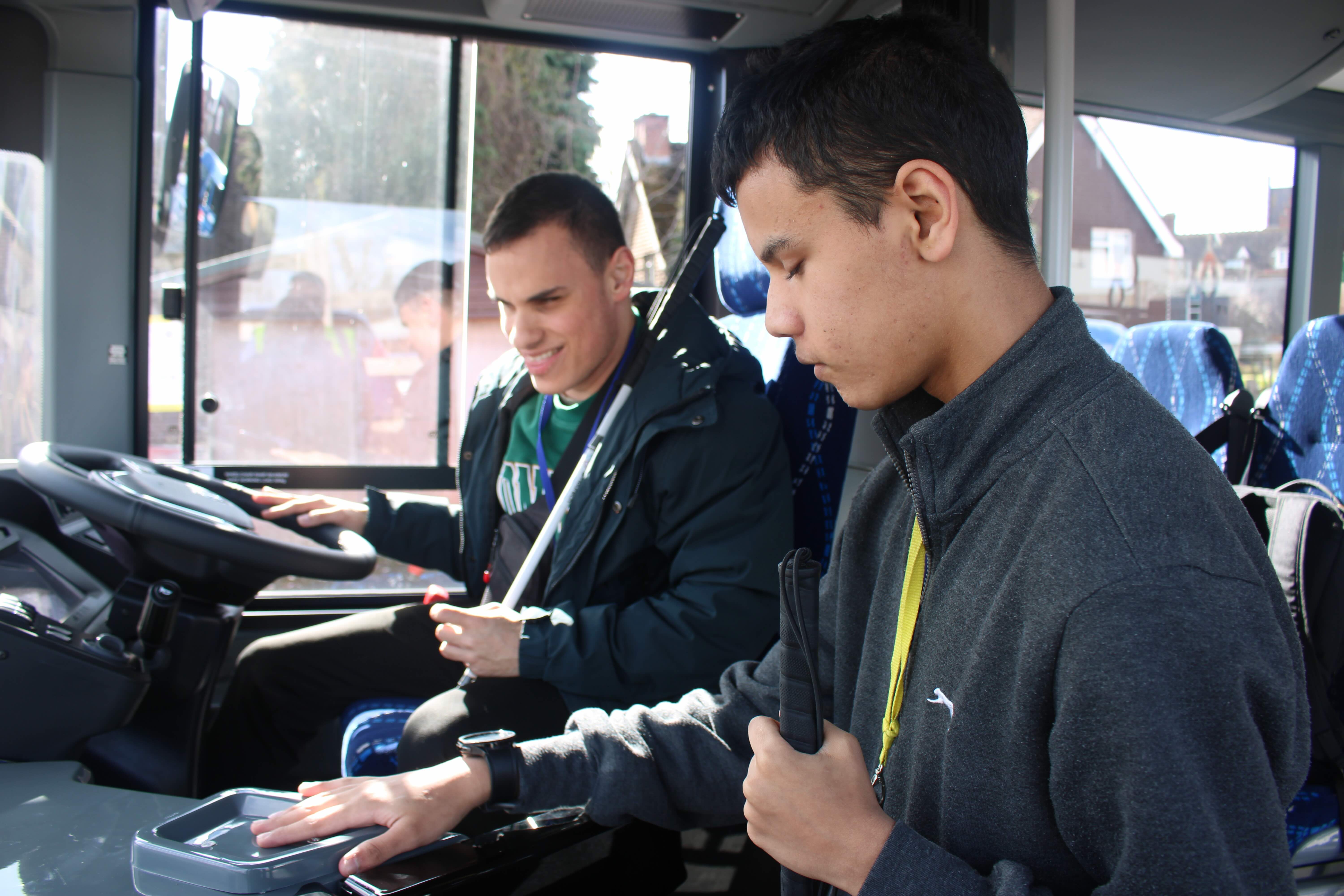 Michal in the driving seat as Zayed pretends to pay