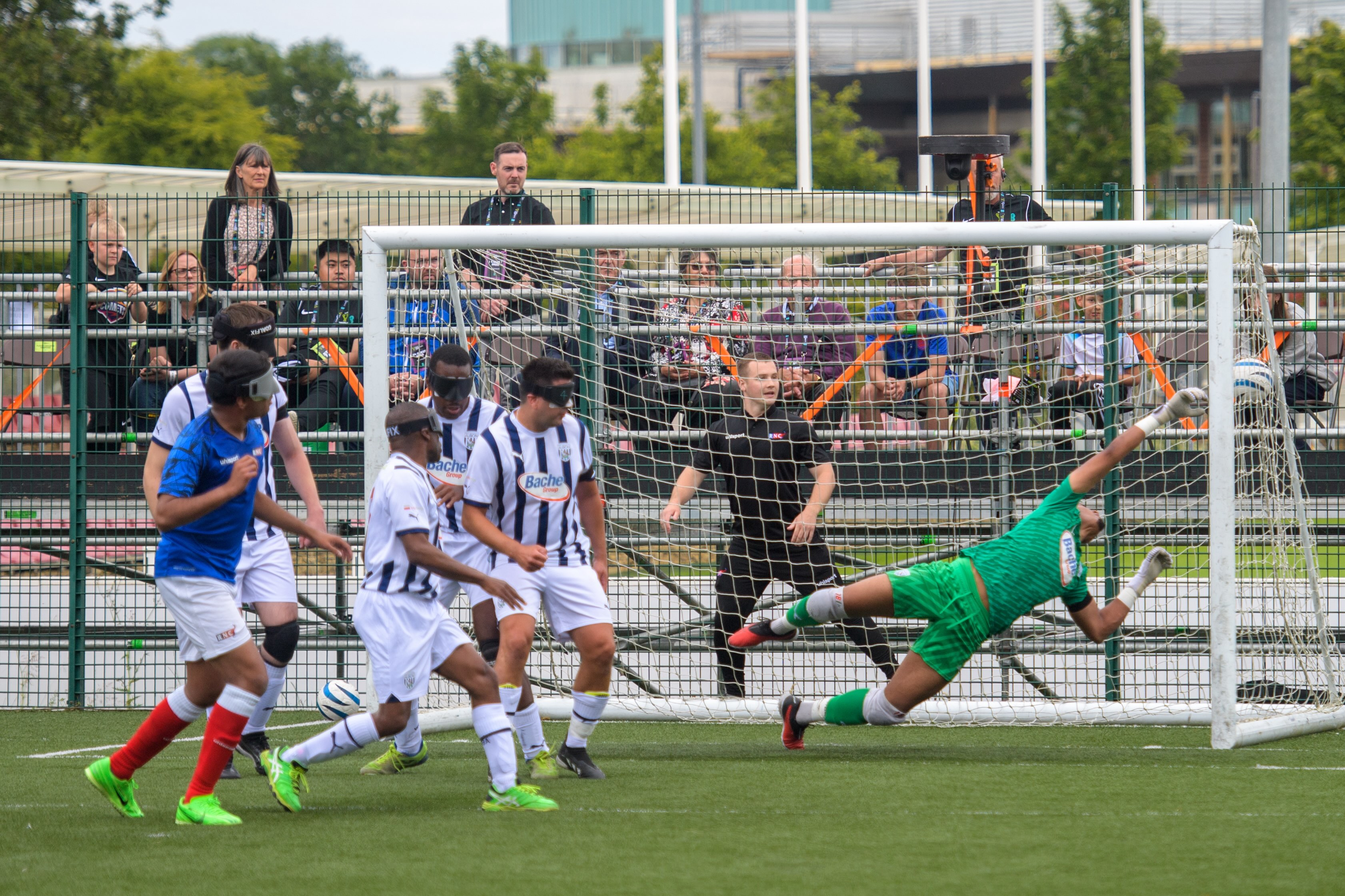 The WBA stretches to attempt a save from a strike from RNCs player